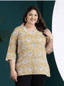 Woman wearing a maroon indian kurti for women by Nishtha Chadda