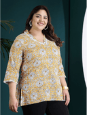 Woman wearing a maroon indian kurti for women by Nishtha Chadda