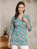 Woman wearing a olive indian kurti for women by Nishtha Chadda
