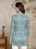 Woman wearing a olive indian kurti for women by Nishtha Chadda
