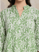 Woman wearing a brown indian kurti for women by Nishtha Chadda