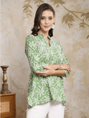 Woman wearing a brown indian kurti for women by Nishtha Chadda