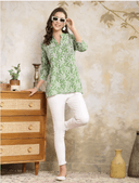 Woman wearing a brown indian kurti for women by Nishtha Chadda