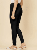 Woman wearing a beige cotton tunic for women by Nishtha Chadda