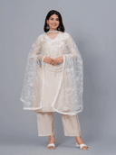 Woman wearing a grey kurti set with dupatta by Nishtha Chadda