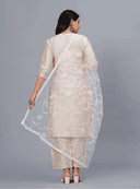 Woman wearing a grey kurti set with dupatta by Nishtha Chadda
