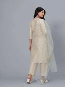 Woman wearing a beige cotton tunic for women by Nishtha Chadda