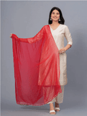Woman wearing a beige cotton tunic for women by Nishtha Chadda