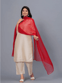 Woman wearing a beige cotton tunic for women by Nishtha Chadda