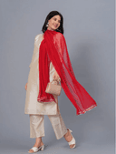 Woman wearing a beige cotton tunic for women by Nishtha Chadda