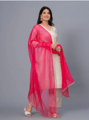 Woman wearing a beige cotton tunic for women by Nishtha Chadda