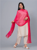 Woman wearing a beige cotton tunic for women by Nishtha Chadda