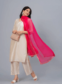 Woman wearing a beige cotton tunic for women by Nishtha Chadda