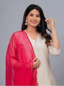 Woman wearing a beige cotton tunic for women by Nishtha Chadda