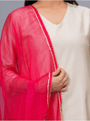 Woman wearing a beige cotton tunic for women by Nishtha Chadda