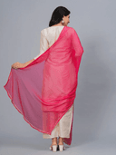 Woman wearing a beige cotton tunic for women by Nishtha Chadda