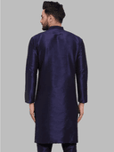 Model wearing a navy party wear kurta by Nishtha Chadda