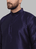 Model wearing a navy party wear kurta by Nishtha Chadda