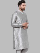 Model wearing a grey party wear kurta by Nishtha Chadda