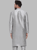 Model wearing a grey party wear kurta by Nishtha Chadda