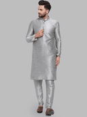 Model wearing a grey party wear kurta by Nishtha Chadda