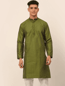 Model wearing a olive party wear kurta by Nishtha Chadda
