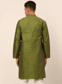 Model wearing a olive party wear kurta by Nishtha Chadda