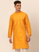 Model wearing a olive party wear kurta by Nishtha Chadda