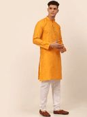 Model wearing a olive party wear kurta by Nishtha Chadda