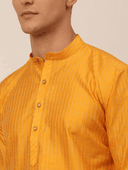 Model wearing a olive party wear kurta by Nishtha Chadda