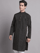 Model wearing a grey party wear kurta by Nishtha Chadda