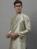 Model wearing a olive party wear kurta by Nishtha Chadda