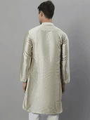 Model wearing a olive party wear kurta by Nishtha Chadda