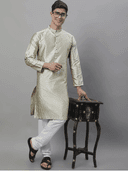 Model wearing a olive party wear kurta by Nishtha Chadda
