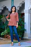 Woman wearing a navy kurti set with dupatta by Nishtha Chadda