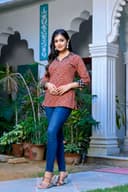 Woman wearing a navy kurti set with dupatta by Nishtha Chadda