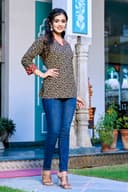 Woman wearing a navy kurti set with dupatta by Nishtha Chadda