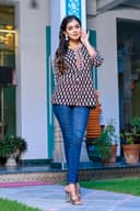 Woman wearing a navy kurti set with dupatta by Nishtha Chadda