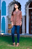 Woman wearing a black kurti set with dupatta by Nishtha Chadda