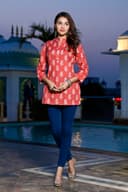 Woman wearing a navy kurti set with dupatta by Nishtha Chadda