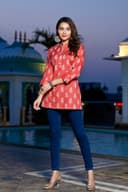 Woman wearing a navy kurti set with dupatta by Nishtha Chadda