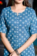 Woman wearing a navy kurti set with dupatta by Nishtha Chadda