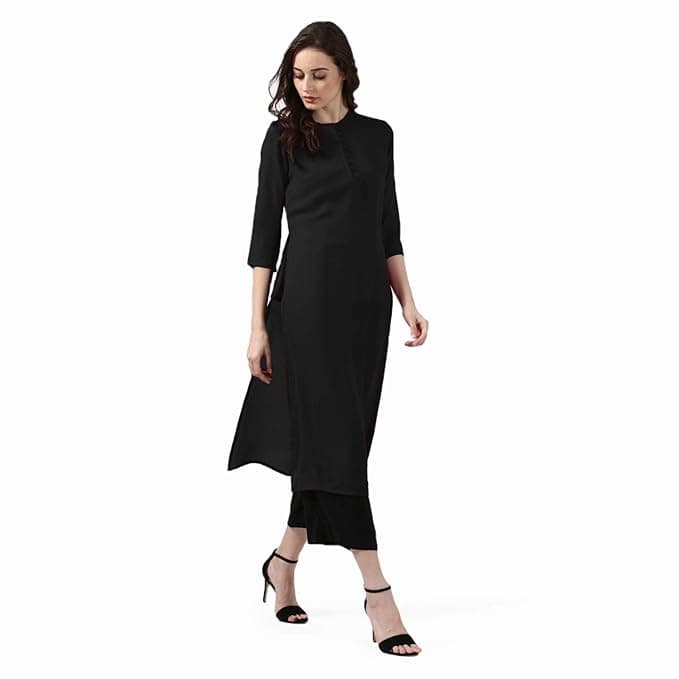 Woman wearing a brown party wear ethnic kurta style by Nishtha Chadda