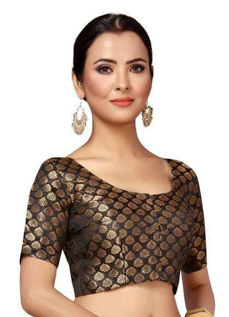 Woman wearing a brown party wear ethnic kurta style by Nishtha Chadda