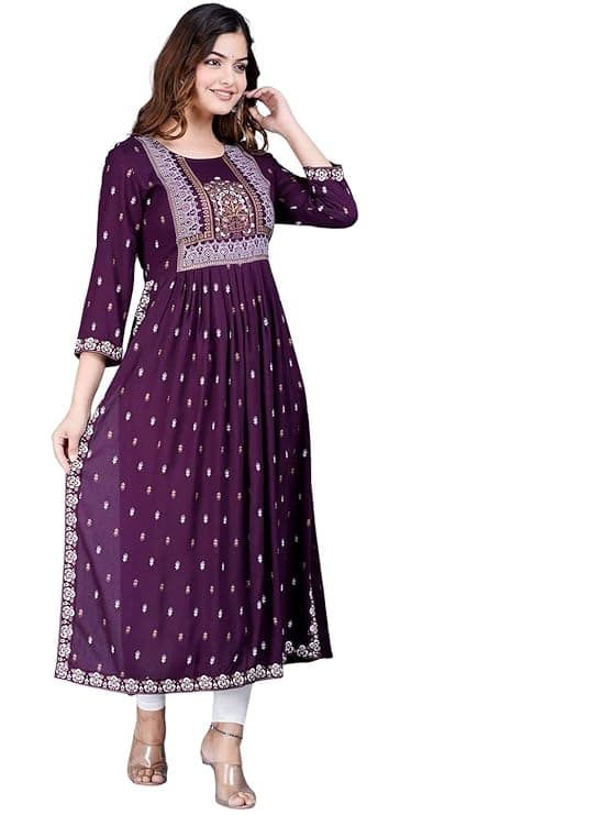 Woman wearing a maroon party wear ethnic kurta style by Nishtha Chadda