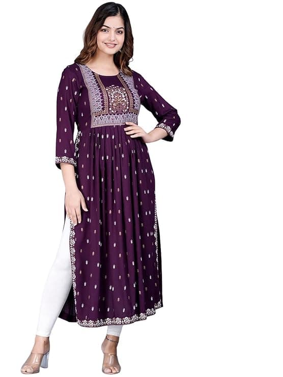 Woman wearing a black party wear ethnic kurta style by Nishtha Chadda