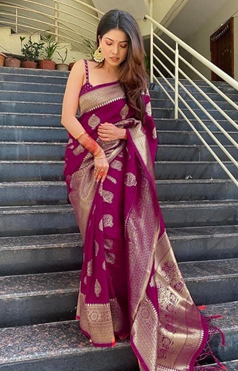 Woman wearing a maroon party wear ethnic kurta style by Nishtha Chadda