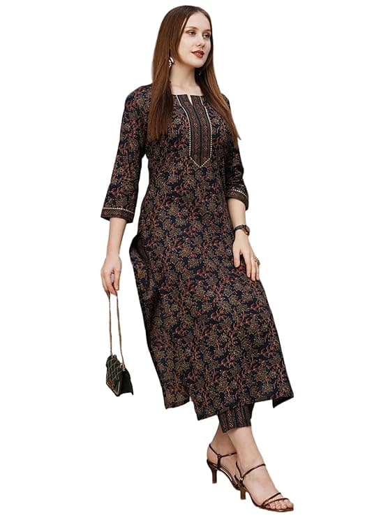 Woman wearing a brown party wear ethnic kurta style by Nishtha Chadda