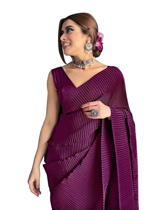 Woman wearing a maroon party wear ethnic kurta style by Nishtha Chadda