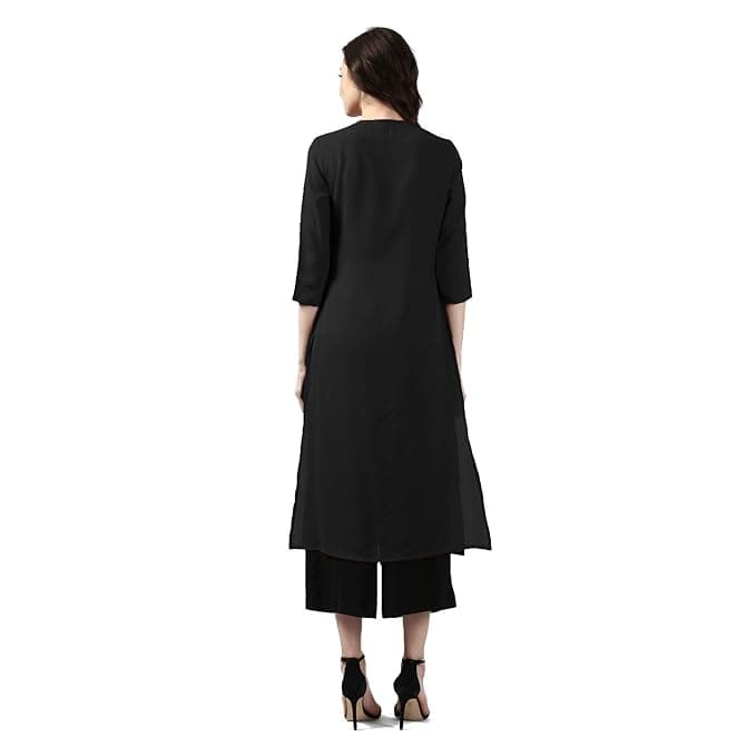Woman wearing a navy party wear ethnic kurta style by Nishtha Chadda